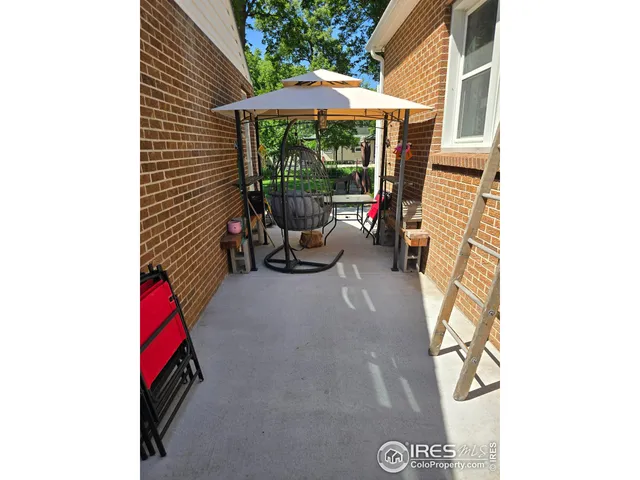 a backyard of a house with seating space