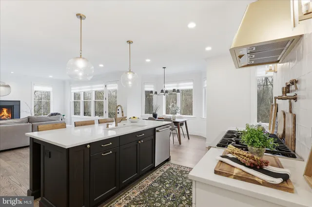 a kitchen with sink and stove