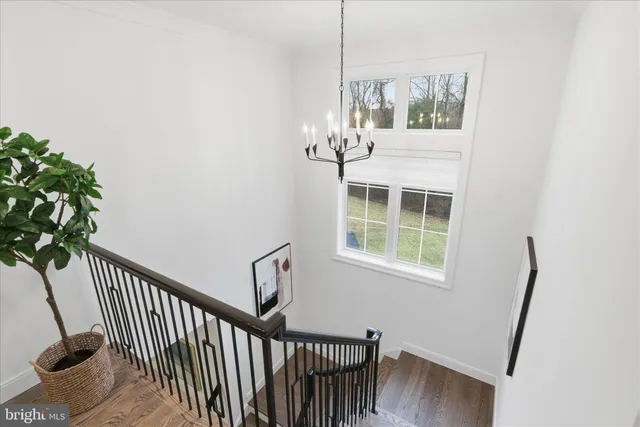 a view of a balcony with wooden floor