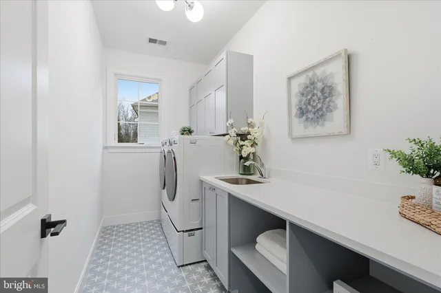 a kitchen with a sink and a window