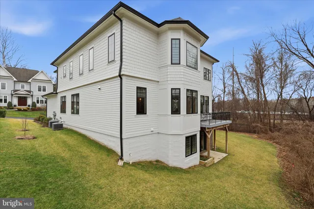 a picture of a bench in front of a wall