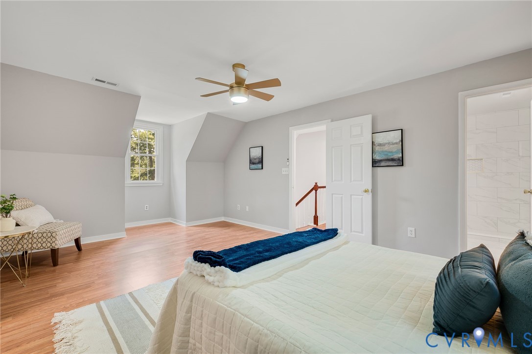 10110 Holly Road Mechanicsville, VA 23116 - Photo 21 of 26 Spacious room featuring wood-finish flooring, ligh