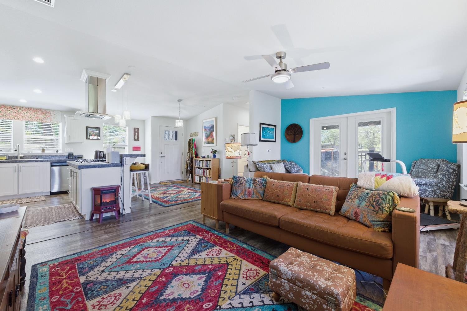 5015 Shooting Star Road Pollock Pines, CA 95726 - Photo 2 of 44 a living room with furniture and a rug