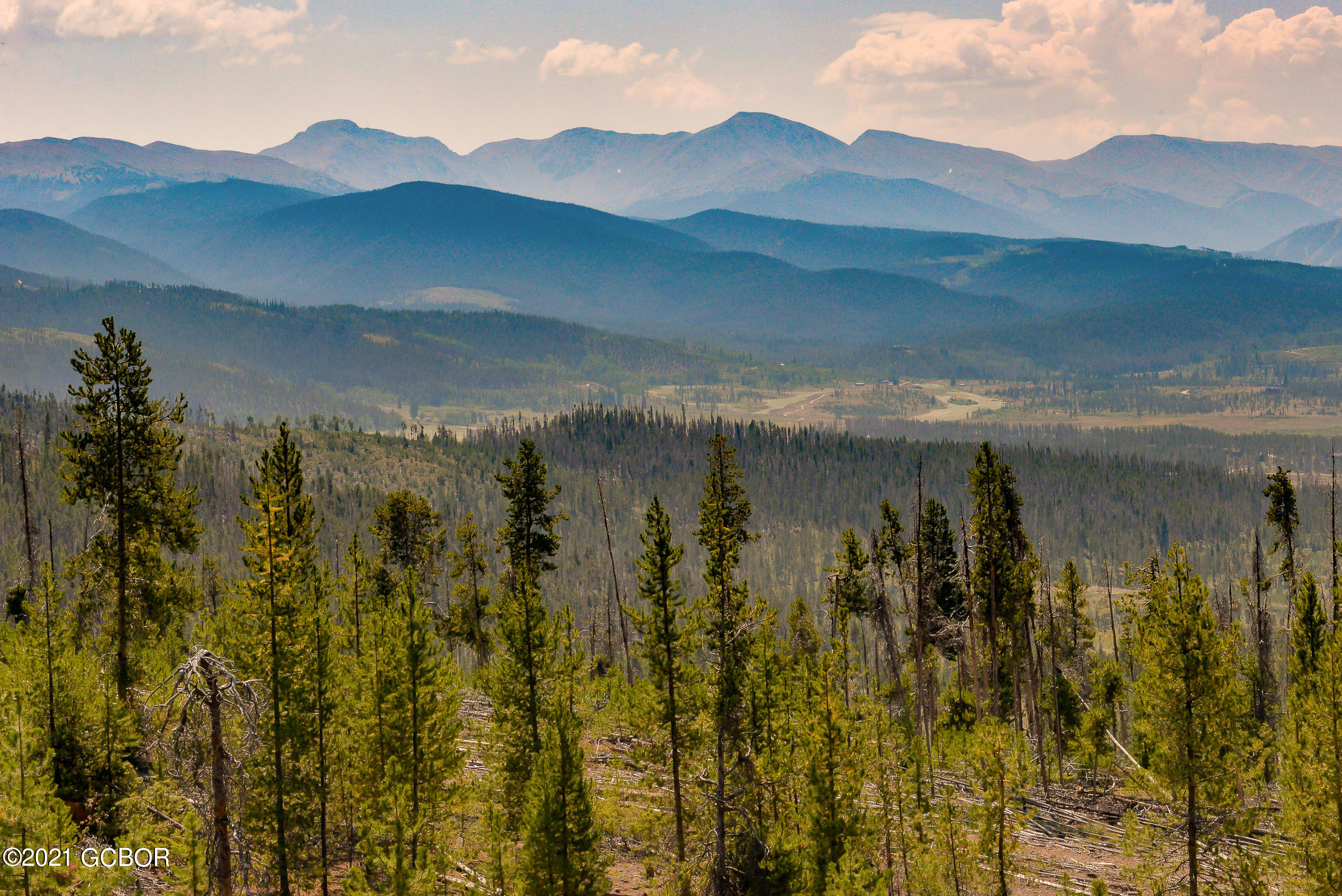128 Tabernash Co 80478 Tabernash, CO 80478 - Photo 3 of 7 a view of a lake in front of a house