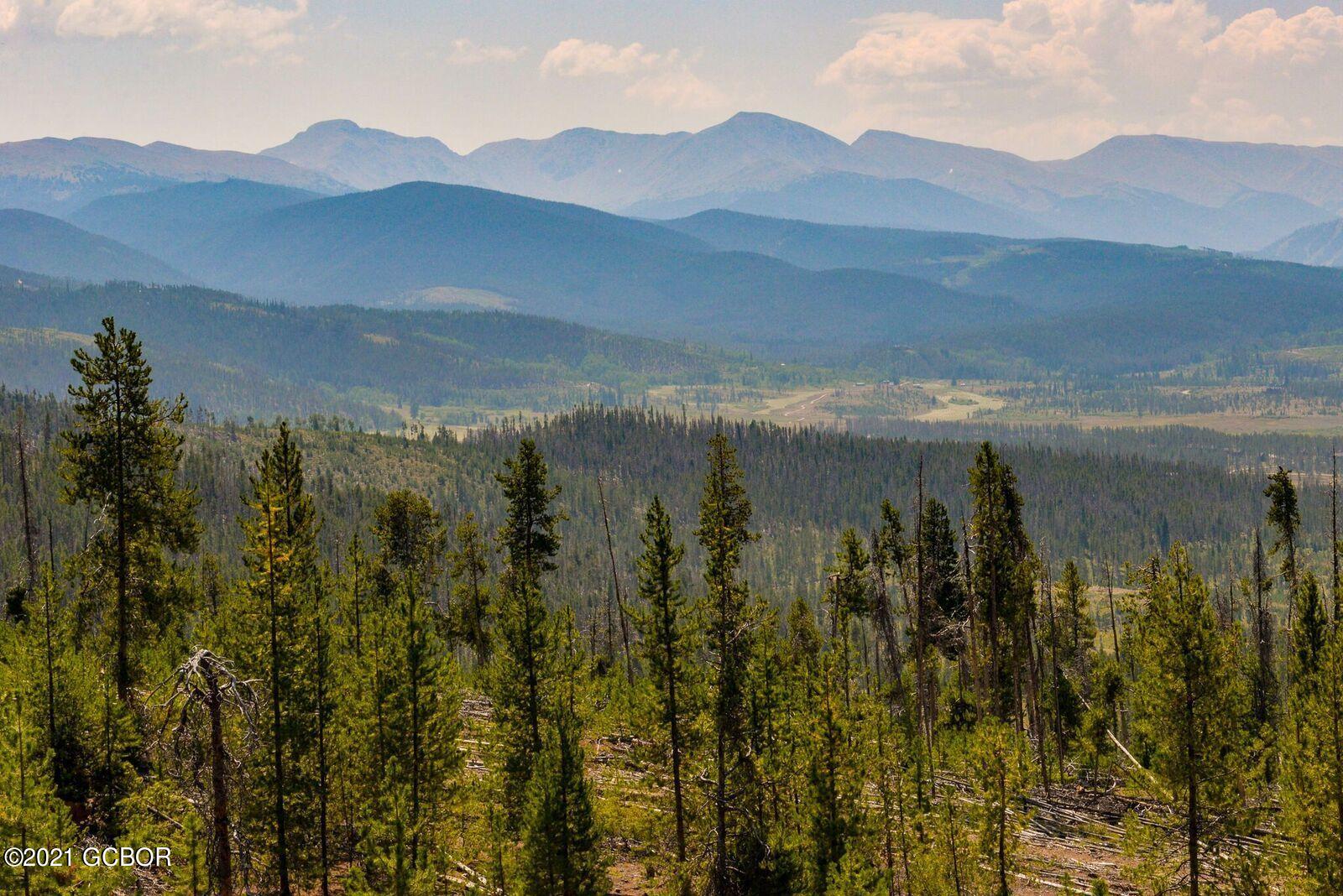 128 Tabernash Co 80478 Tabernash, CO 80478 - Photo 5 of 7 a view of a town with mountains in the background