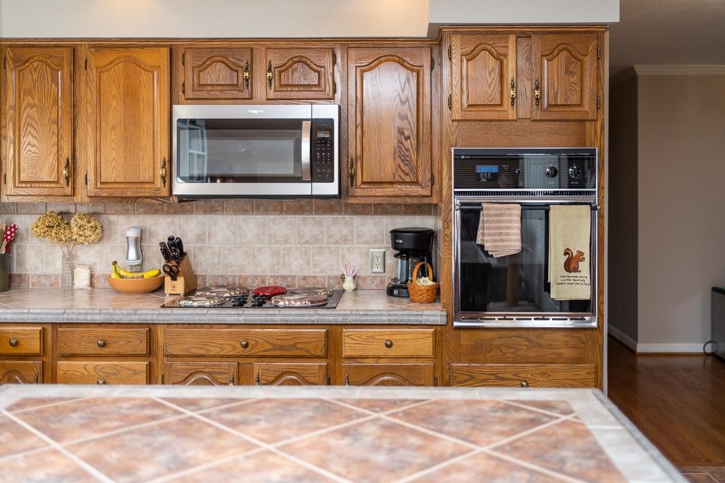624 Augusta Farms Road Waynesboro, VA 22980 - Photo 24 of 63 a kitchen with stainless steel appliances granite countertop a sink and cabinets
