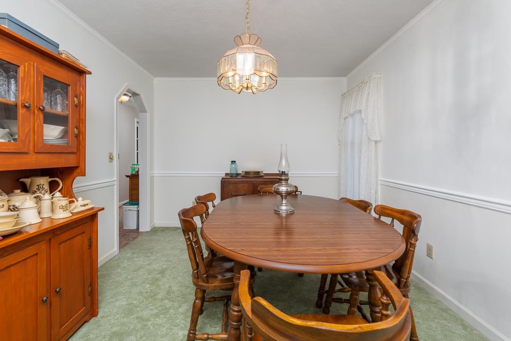 624 Augusta Farms Road Waynesboro, VA 22980 - Photo 28 of 63 a dining room with furniture and chandelier
