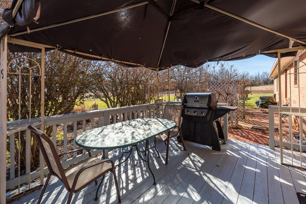 624 Augusta Farms Road Waynesboro, VA 22980 - Photo 41 of 63 a view of a chairs and table in the patio