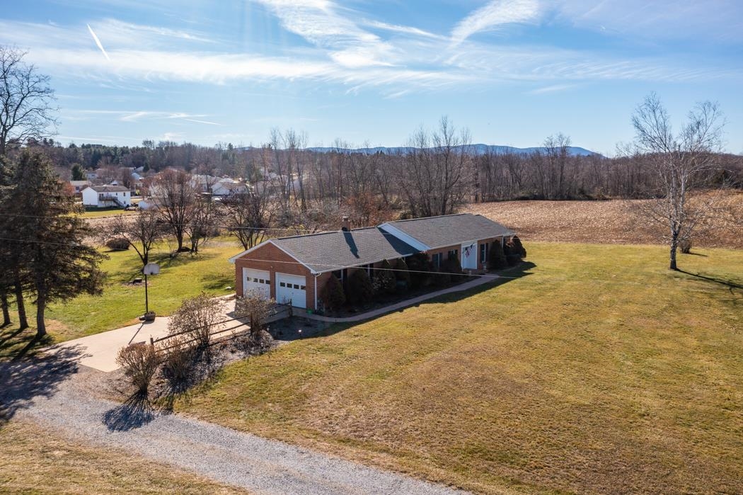 624 Augusta Farms Road Waynesboro, VA 22980 - Photo 45 of 63 a view of residential houses with yard and mountain view in back