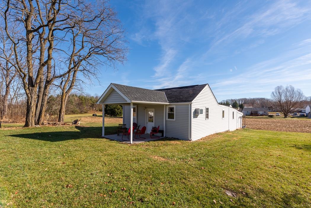 624 Augusta Farms Road Waynesboro, VA 22980 - Photo 53 of 63 a view of a house with a yard and garage