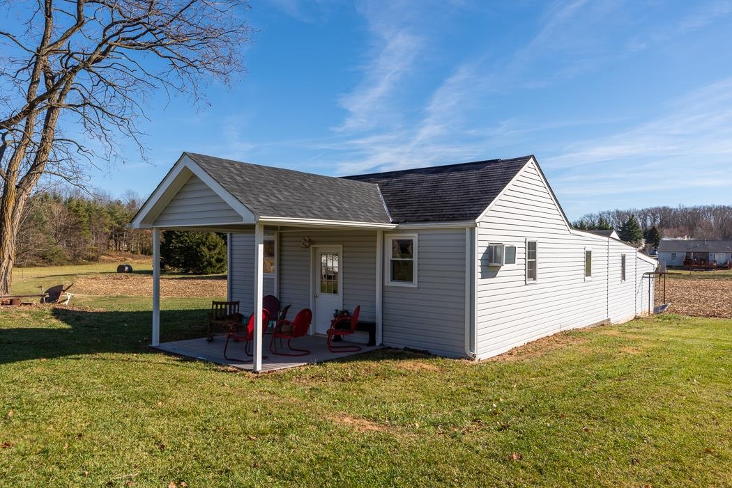 624 Augusta Farms Road Waynesboro, VA 22980 - Photo 54 of 63 a view of a house with backyard and porch