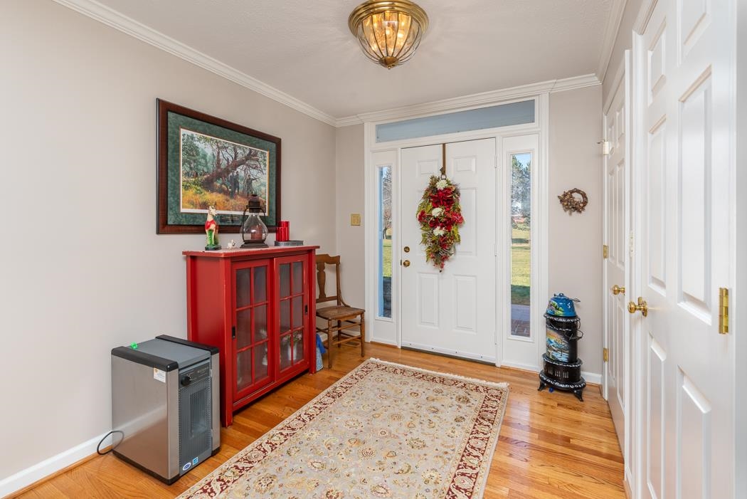 624 Augusta Farms Road Waynesboro, VA 22980 - Photo 6 of 63 a view of an entryway with wooden floor