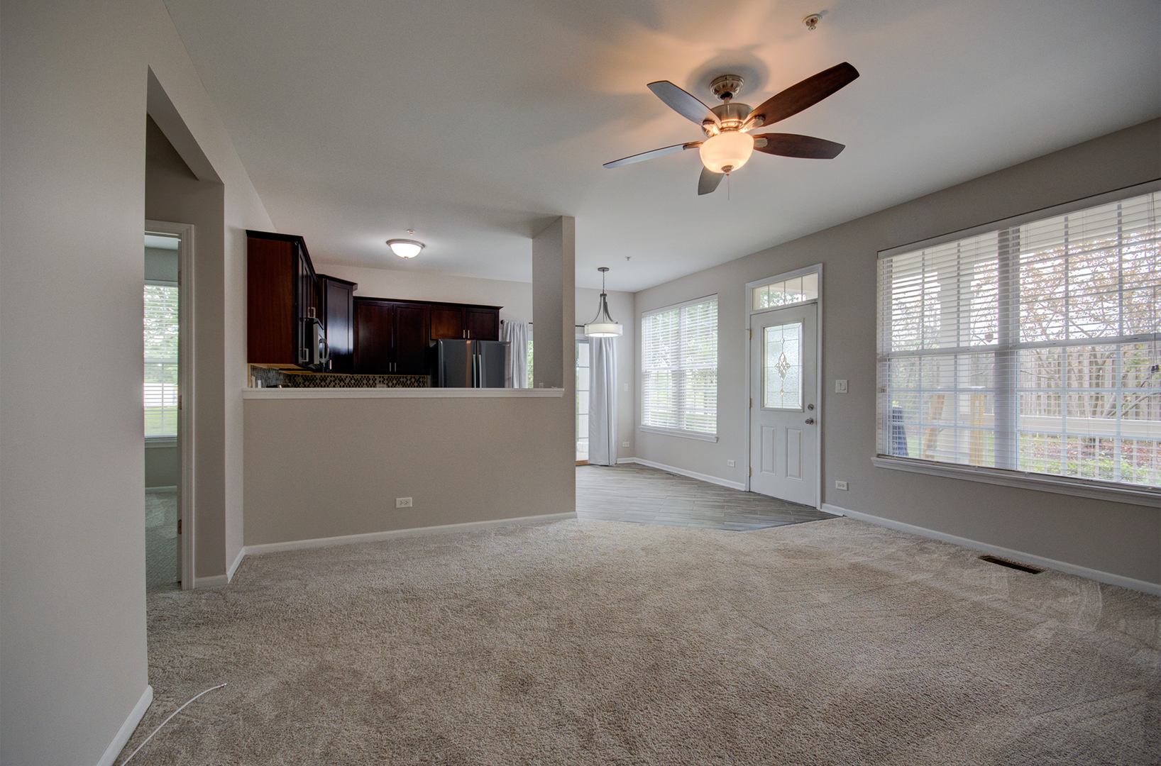 4401 Timber Ridge Court, Unit 4401 Joliet, IL 60431 - Photo 8 of 28 a view of an empty room with a window