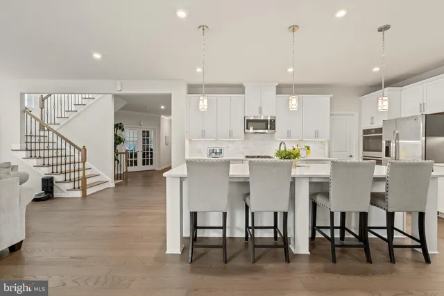 a room with a table and a workspace