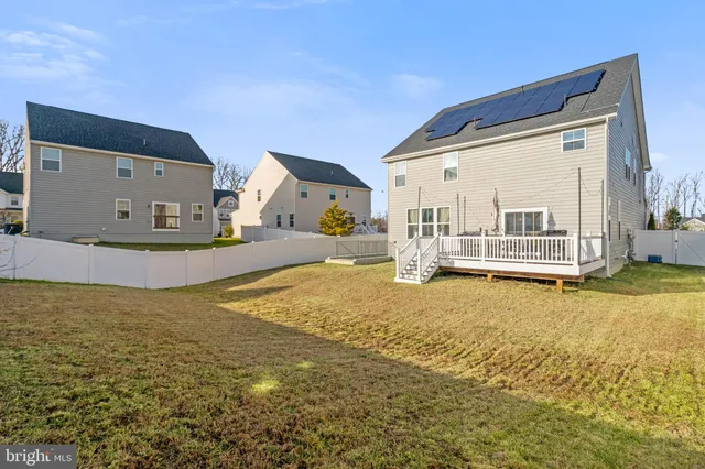 a view of a dinning table and chairs in terrace