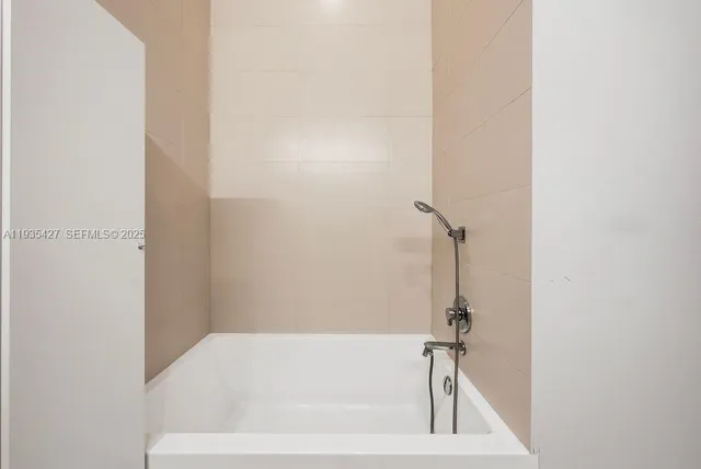 a bathroom with a bathtub