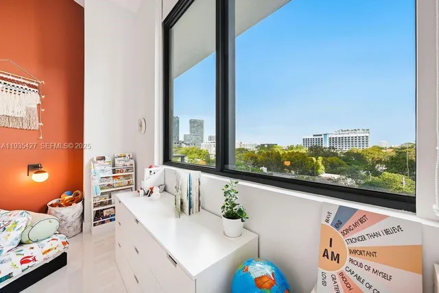 a room with furniture and window