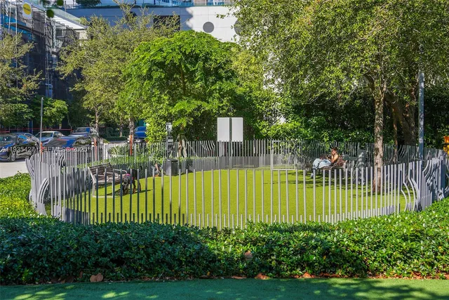 a view of a backyard with a garden and plants