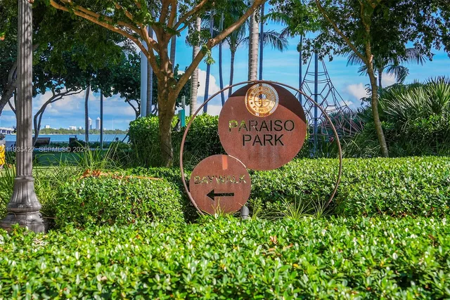 a sign that is on a brick wall