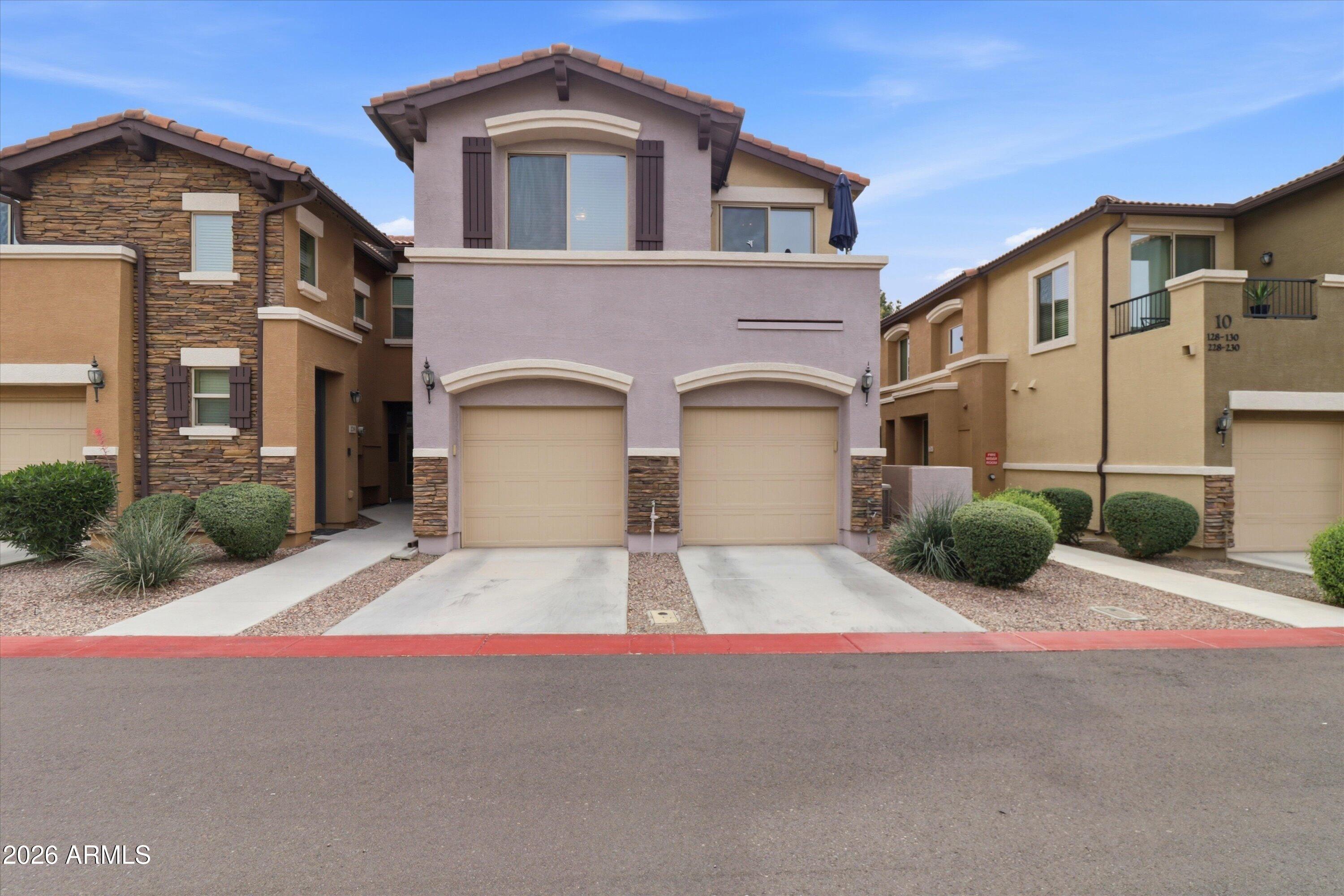 a front view of a house with yard