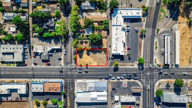 an aerial view of a city with lots of residential buildings