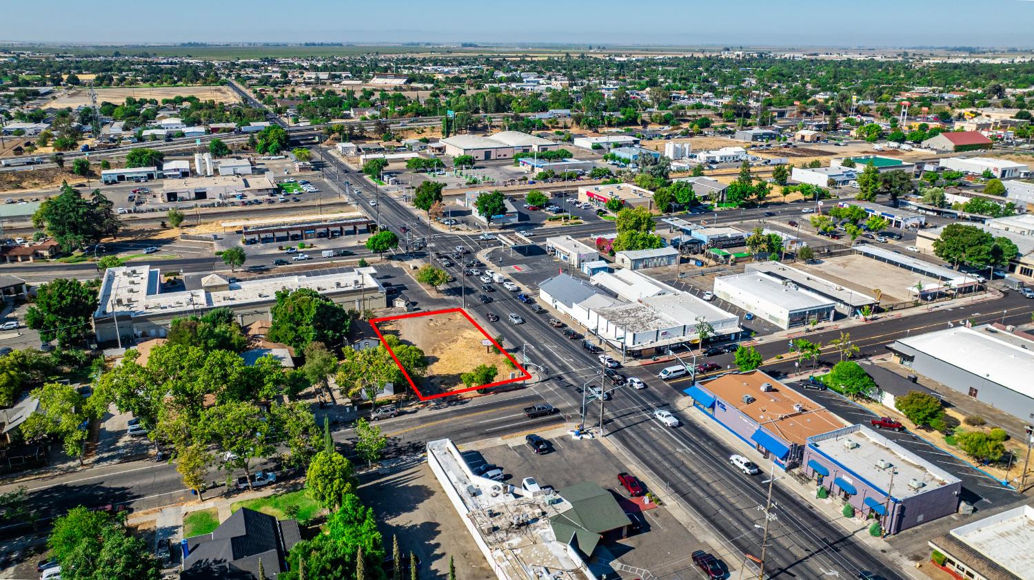 4 East Main Street Merced, CA 95340 - Photo 12 of 13 an aerial view of a city with lots of residential buildings