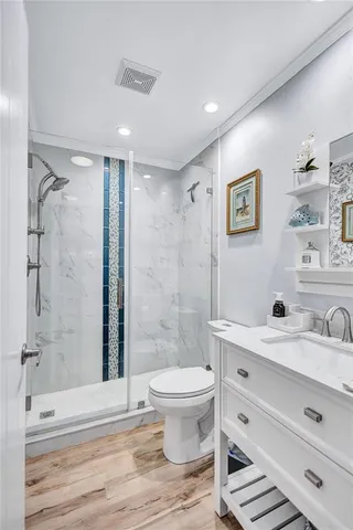 a view of outdoor sitting area with furniture and garden view