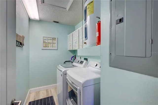 a backyard of a house with a garden and pathway