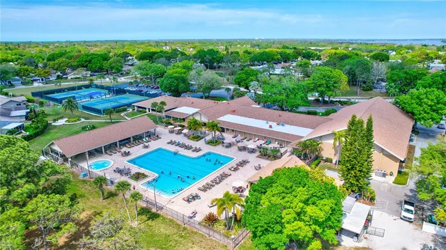a view of yard with patio