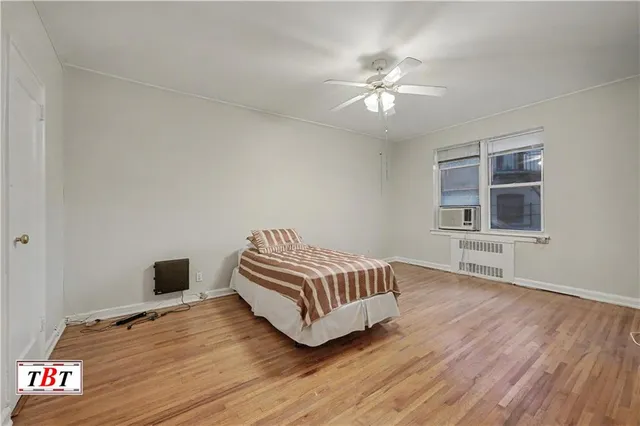 a kitchen with stainless steel appliances granite countertop a refrigerator a stove and a sink with cabinets