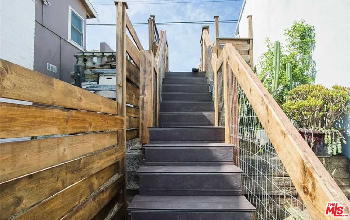 7032 Trask Avenue Playa del Rey, CA 90293 - Photo 15 of 35 a view of entryway with wooden floor and stairs