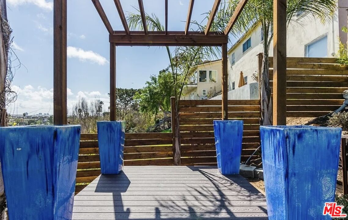 7032 Trask Avenue Playa del Rey, CA 90293 - Photo 26 of 35 a view of outdoor space with wooden floor and outdoor seating