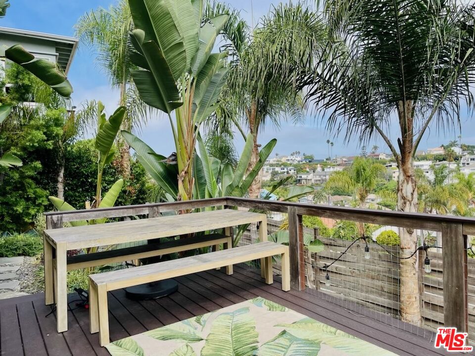 7032 Trask Avenue Playa del Rey, CA 90293 - Photo 30 of 35 a view of a balcony with wooden floor and outdoor space