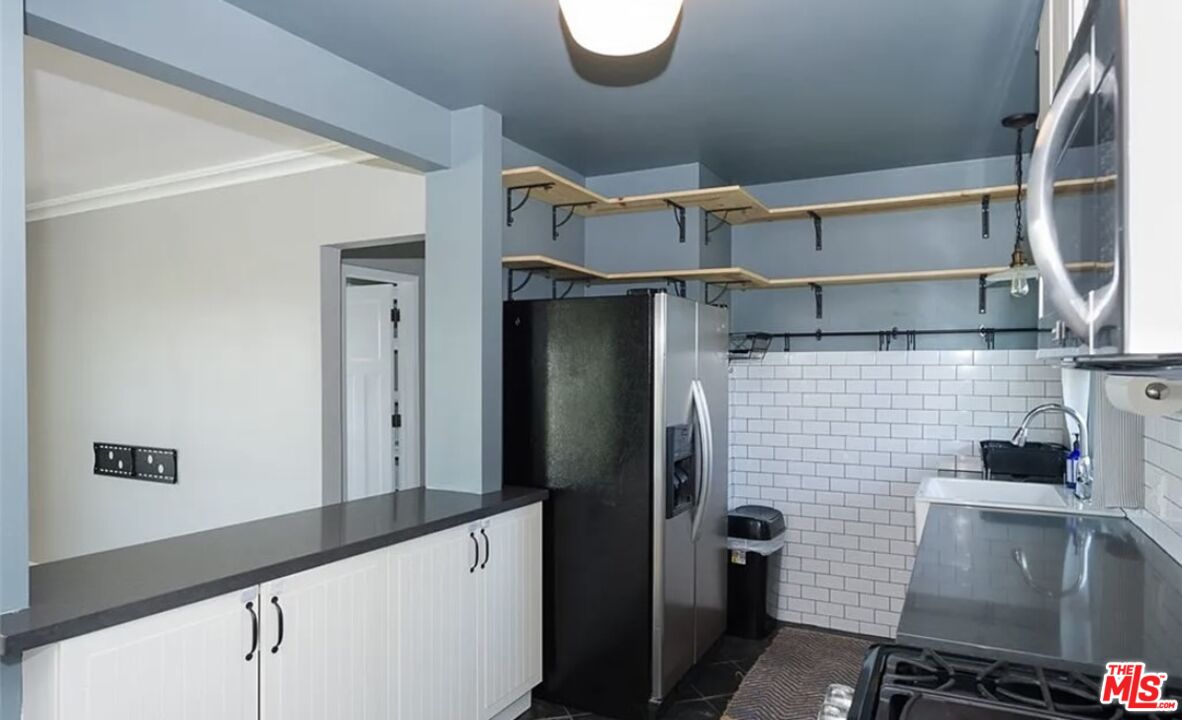 7032 Trask Avenue Playa del Rey, CA 90293 - Photo 10 of 35 a bathroom with a shower and a sink