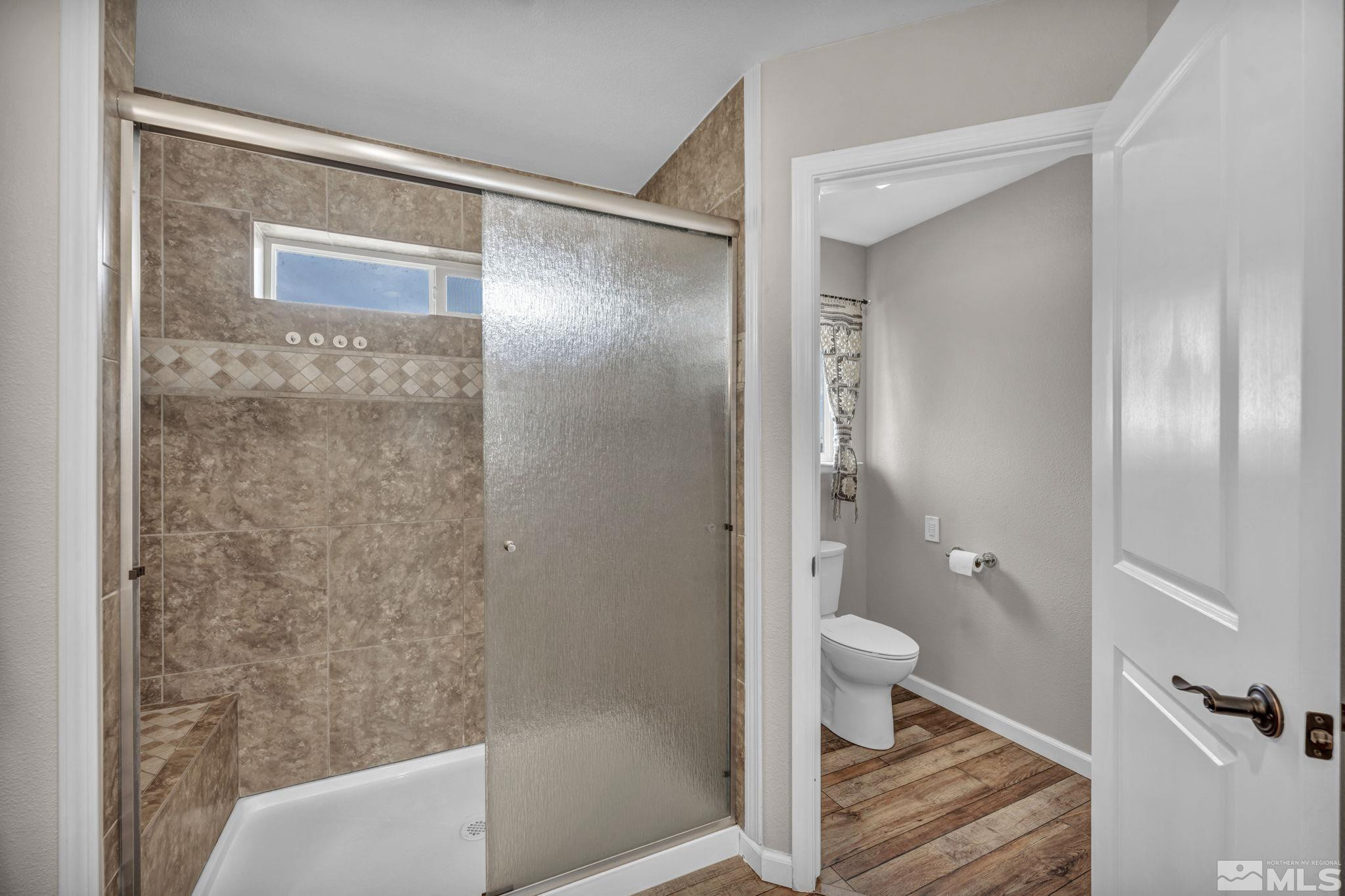 7330 Sandhill Road Fallon, NV 89406 - Photo 18 of 39 a bathroom with a shower and a toilet