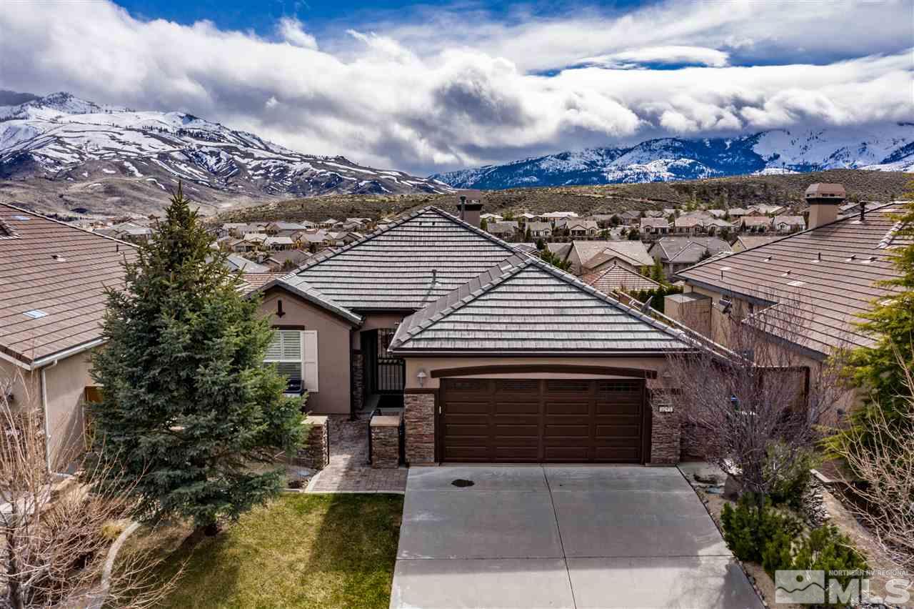 1295 Tarleton Way Reno, NV 89523 - Photo 1 of 23 a front view of a house with a garden