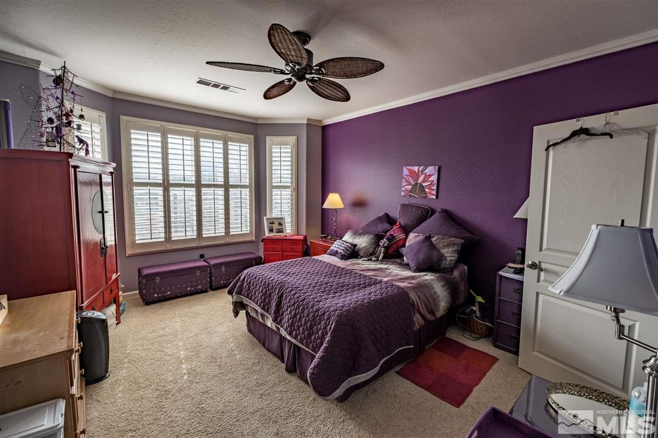 1295 Tarleton Way Reno, NV 89523 - Photo 11 of 23 a bed room with a bed and a ceiling fan