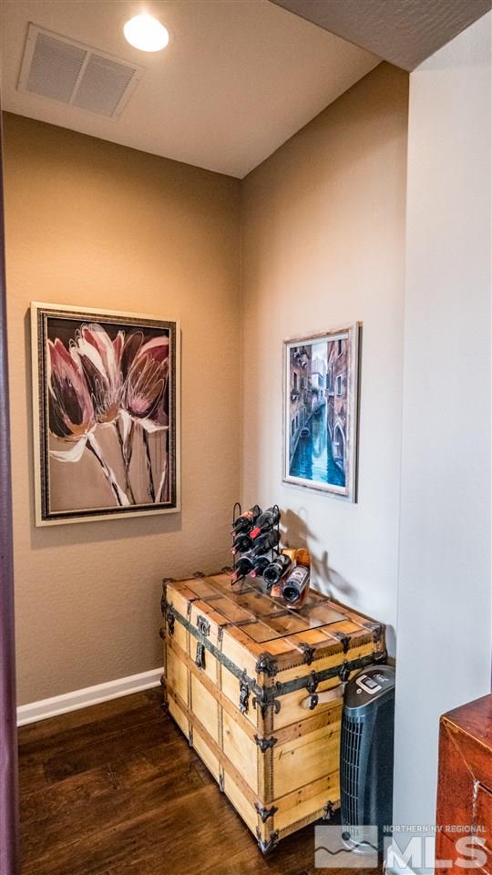 1295 Tarleton Way Reno, NV 89523 - Photo 10 of 23 a room with a bed and painting on the wall