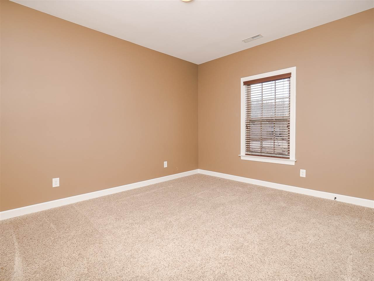 3004 Royal Forrest Drive Raleigh, NC 27614 - Photo 18 of 25 Bedroom three is located on second floor. It adjoins a Jack-n-Jill bath, which has double sinks and a separate tub/commode area. This room has a large walk-in closet with window. Bedroom