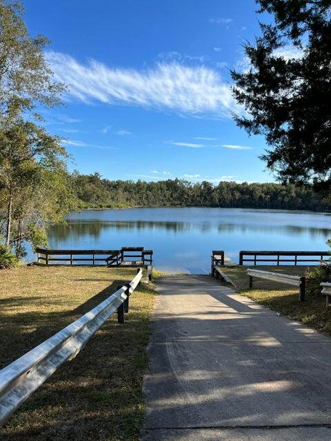 Lot 12 Rio Drive Chipley, FL 32428 - Photo 3 of 12 a view of a lake with houses in the back