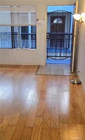 a view of a living room with entryway