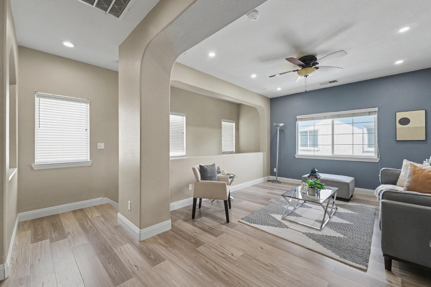 1223 East Springer Drive Turlock, CA 95382 - Photo 39 of 48 a living room with furniture and wooden floor