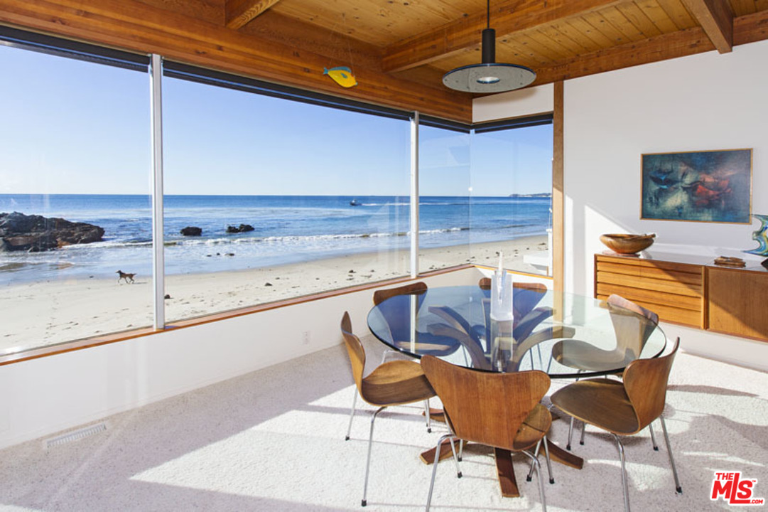 24958 Malibu Road Malibu, CA 90265 - Photo 3 of 50 a view of a chairs and table in the balcony