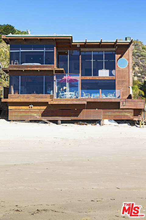 24958 Malibu Road Malibu, CA 90265 - Photo 24 of 50 a front view of a house with a ocean view