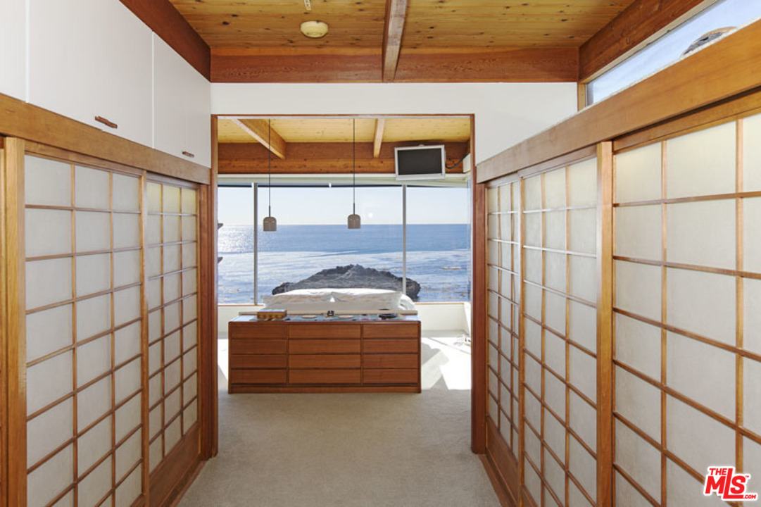 24958 Malibu Road Malibu, CA 90265 - Photo 28 of 50 a room with a large window and parking space