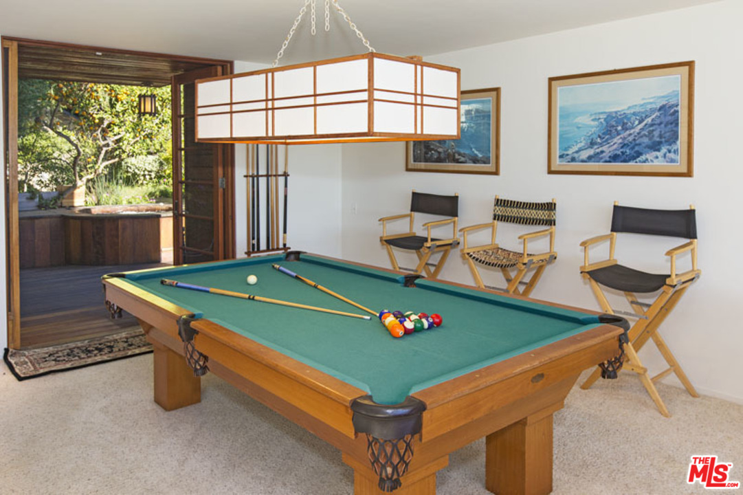 24958 Malibu Road Malibu, CA 90265 - Photo 38 of 50 a room with pool table and windows
