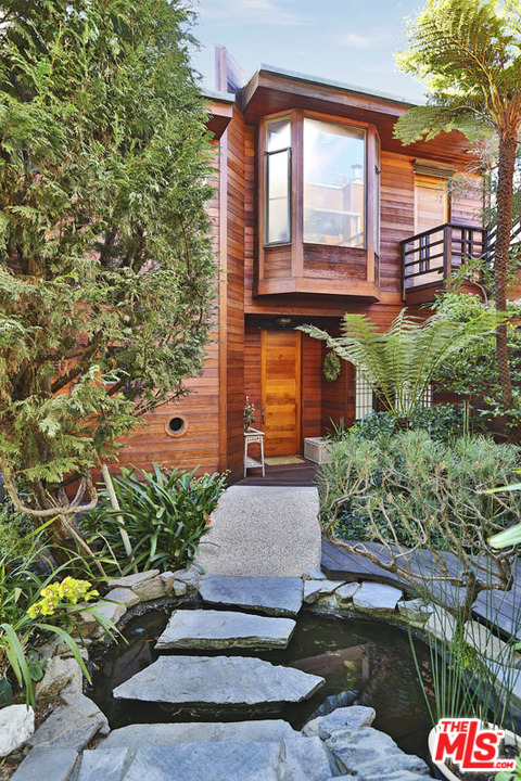 24958 Malibu Road Malibu, CA 90265 - Photo 44 of 50 a front view of a house with a garden