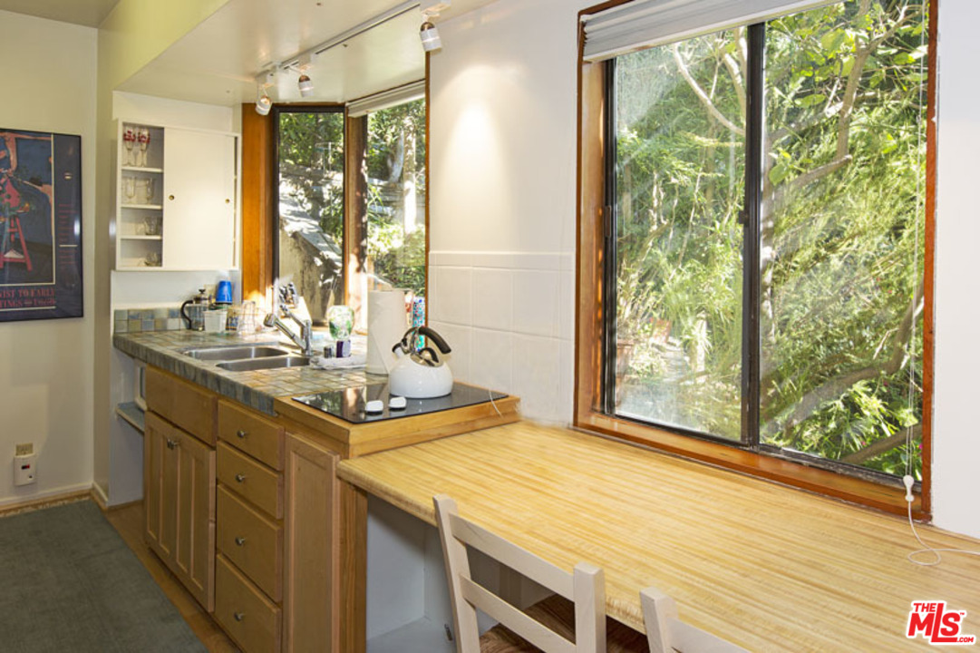 24958 Malibu Road Malibu, CA 90265 - Photo 47 of 50 a kitchen with a sink and large window