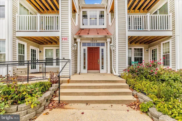 a front view of a house with a porch