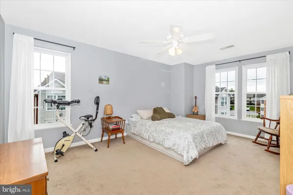 a view of a balcony with wooden floor